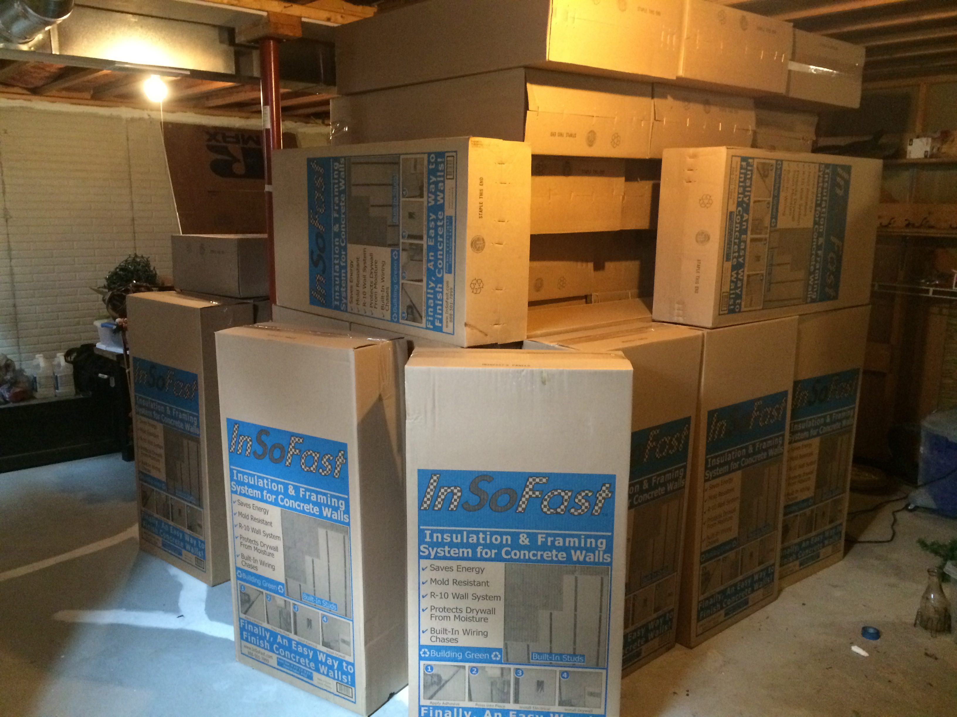 The stud walls would have been a hassle in terms of both the extra work and the process of taking all the materials down to the basement.