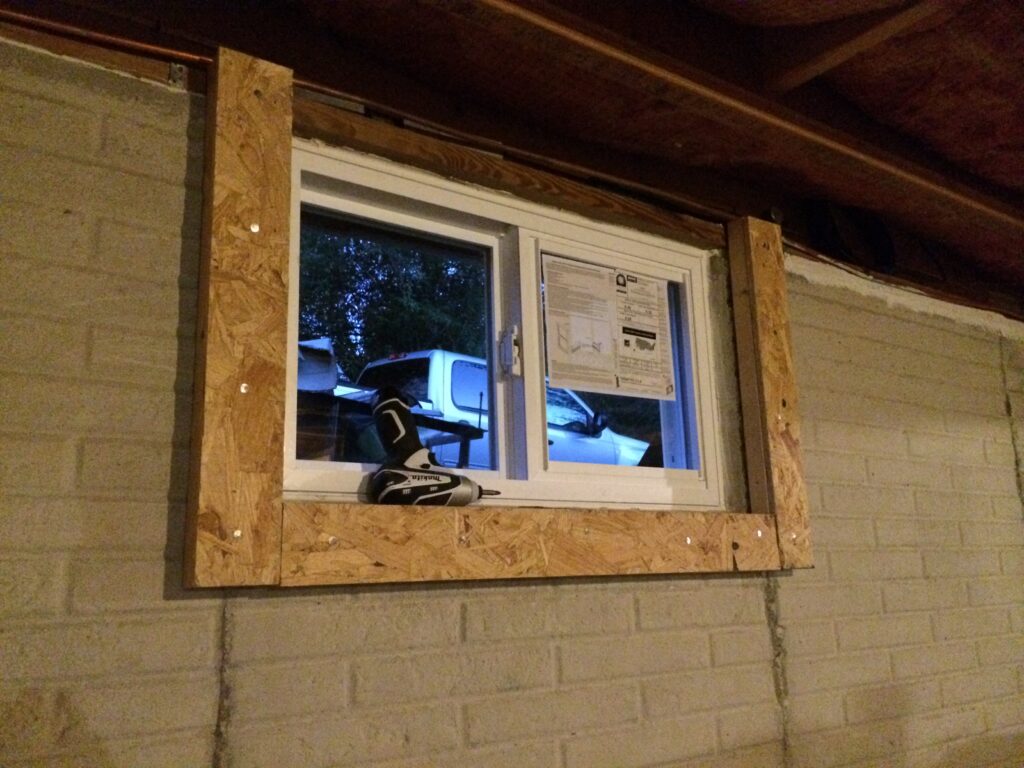 Wood buck for a basement window